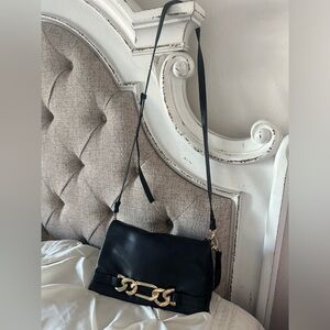 Chic Black Leather Crossbody Bag with Gold Accent